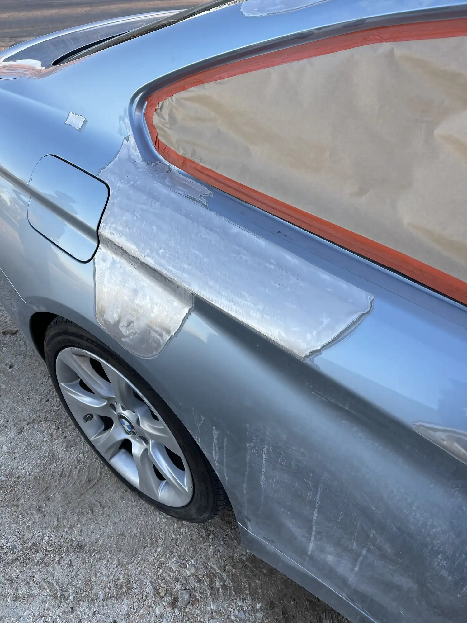 Panel straightened and taken back to bare metal